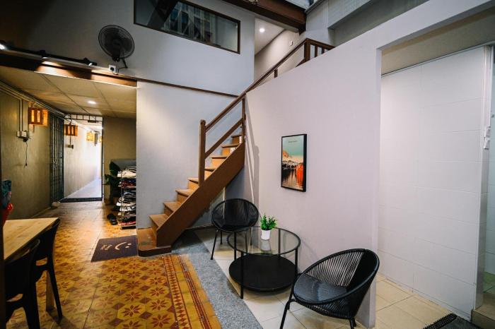 swing and pillows at 87 chulia st
