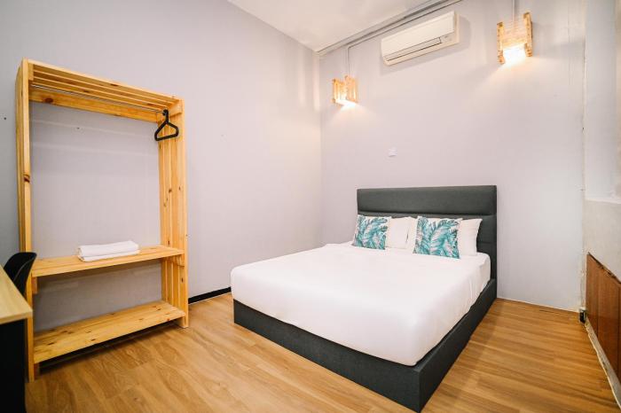 swing and pillows at 87 chulia st