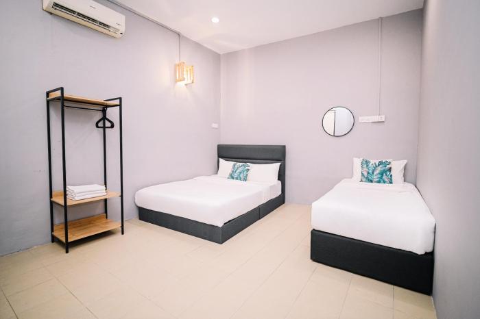 swing and pillows at 87 chulia st