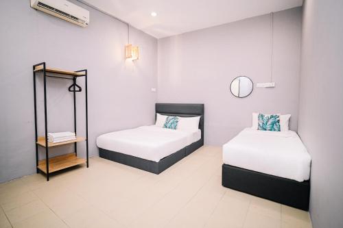 swing and pillows at 87 chulia st