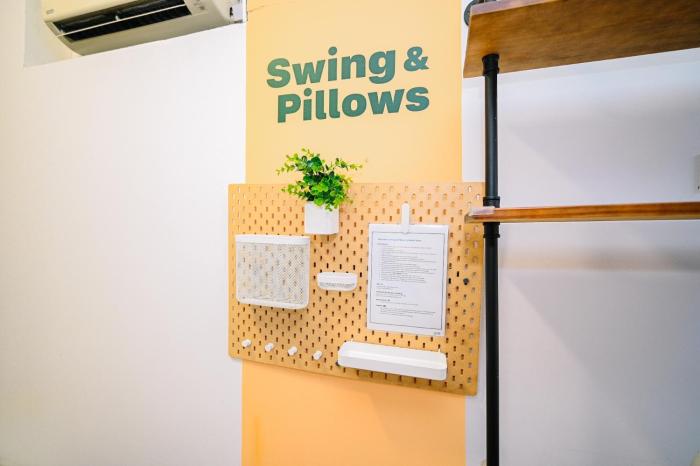 swing and pillows at beach street