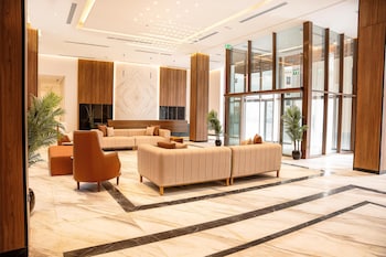golden tulip muscat the village