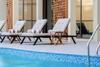 golden tulip muscat the village