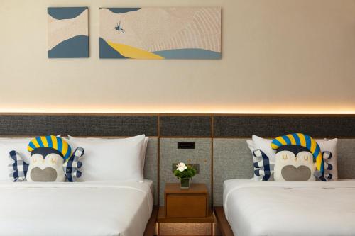 voco ningbo dongqian lake by ihg