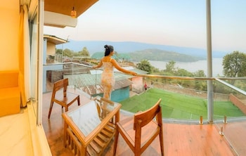 nisarga lake resort tapola