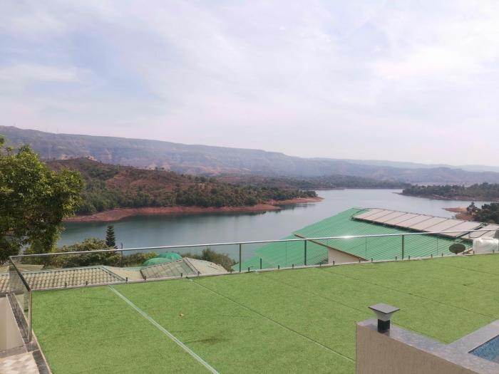 nisarga lake resort tapola