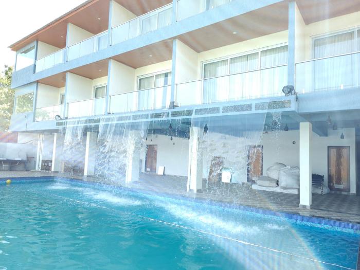 nisarga lake resort tapola