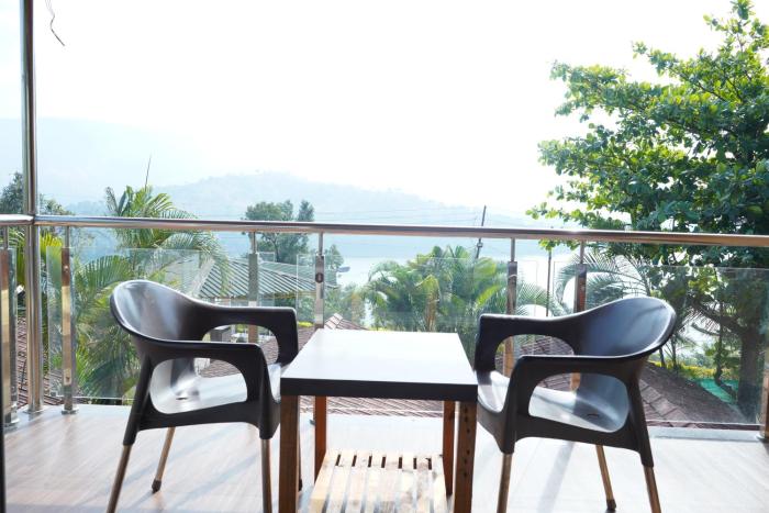 nisarga lake resort tapola