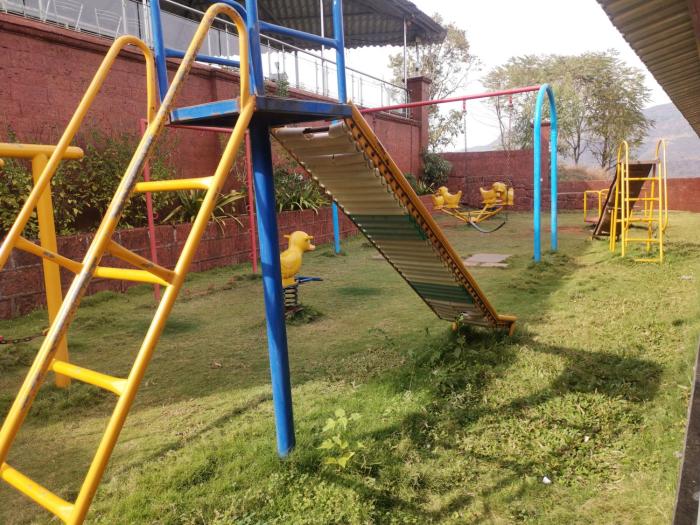 nisarga lake resort tapola
