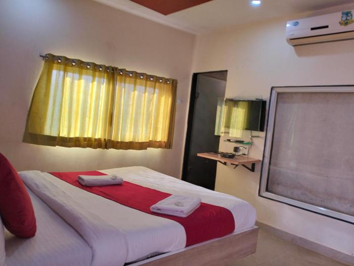 nisarga lake resort tapola