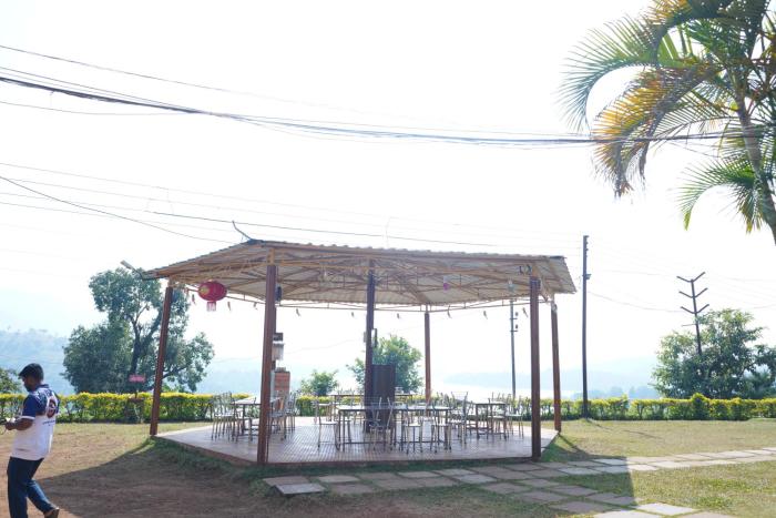 nisarga lake resort tapola