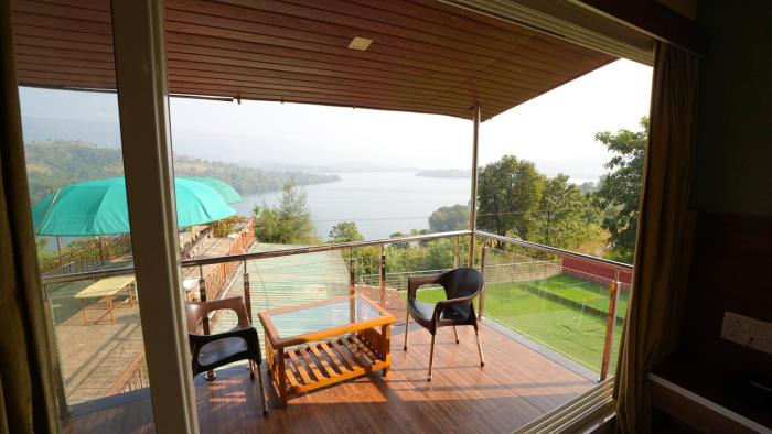 nisarga lake resort tapola