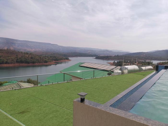 nisarga lake resort tapola