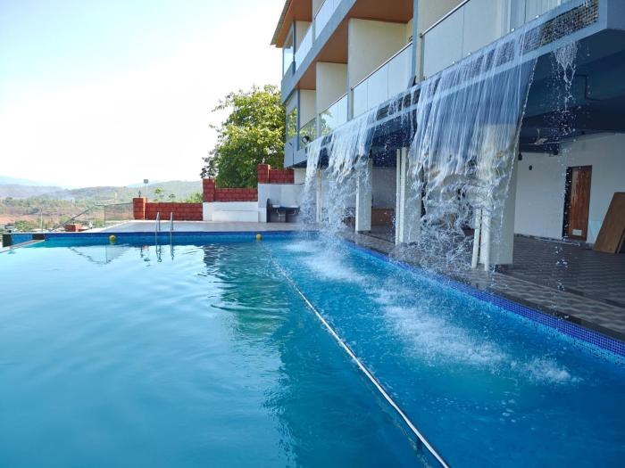 nisarga lake resort tapola