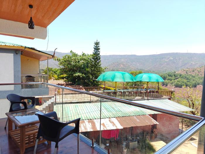 nisarga lake resort tapola