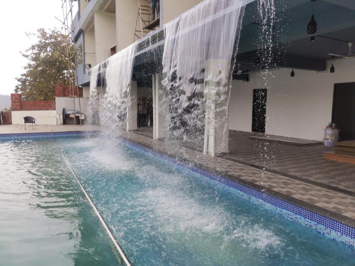 nisarga lake resort tapola