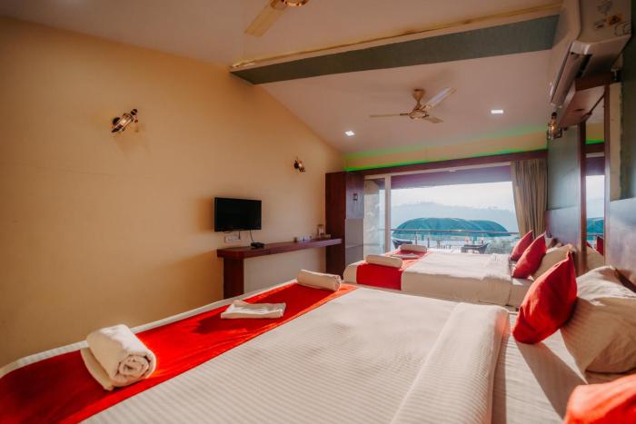 nisarga lake resort tapola