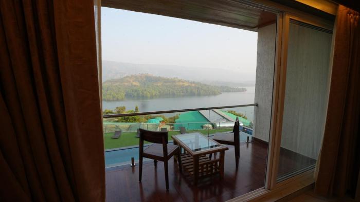nisarga lake resort tapola