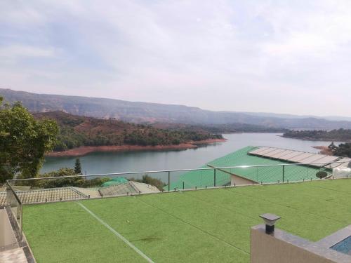 nisarga lake resort tapola