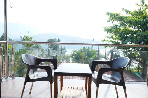 nisarga lake resort tapola