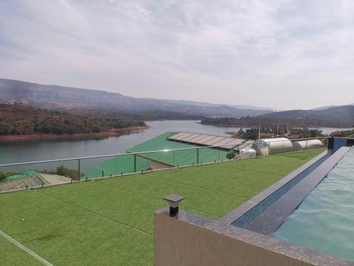 nisarga lake resort tapola