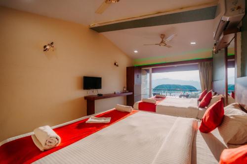 nisarga lake resort tapola