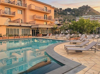 quiete taormina naxos tapestry collection by hilton
