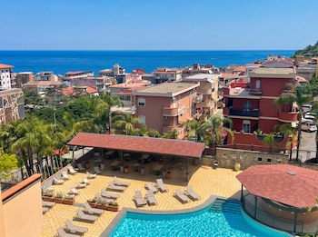 quiete taormina naxos tapestry collection by hilton