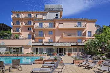 quiete taormina naxos tapestry collection by hilton