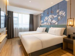 magnotel classic shanghai wusong international cruise baoyang road