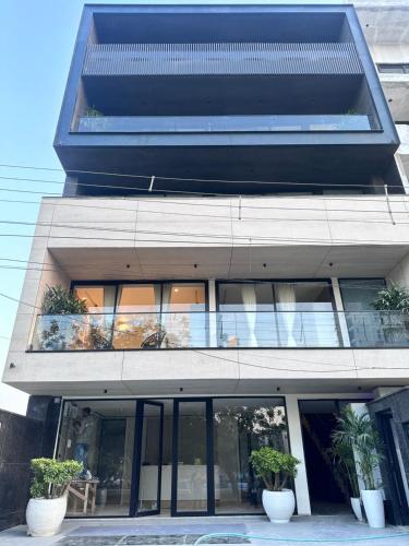 the lodgers 2 bhk apartment near artemis hospital