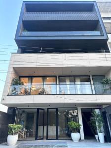 the lodgers 2 bhk apartment near artemis hospital