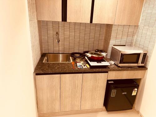 the lodgers 2 bhk apartment near artemis hospital
