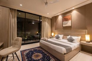 the lodgers 2 bhk apartment near artemis hospital