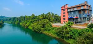 Rivulet Hotel Apartments,Main Road, Mukkam,5 star