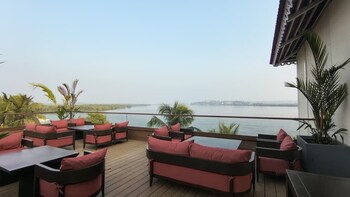 the postcard on the mandovi river