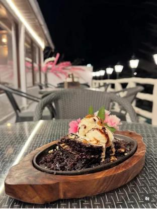 the mountain muse cafe bakery and stay manali