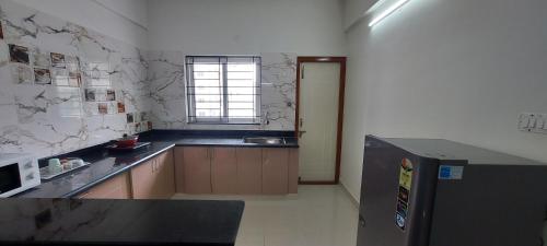 tranquil serviced apartments sarjapur