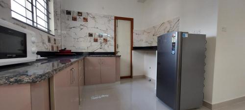 tranquil serviced apartments sarjapur