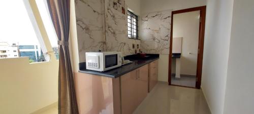 tranquil serviced apartments sarjapur