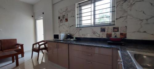tranquil serviced apartments sarjapur