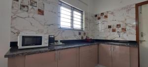 tranquil serviced apartments sarjapur