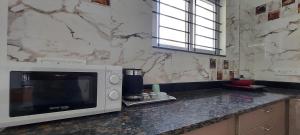 tranquil serviced apartments sarjapur