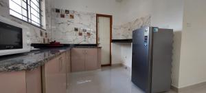tranquil serviced apartments sarjapur