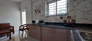 tranquil serviced apartments sarjapur