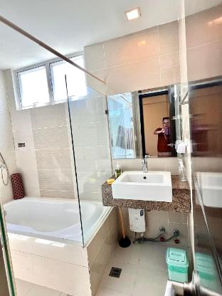 one bedroom with sea view and city lights