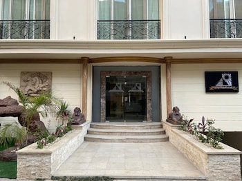 aziz palace front pyramids view and rooftop restaurant