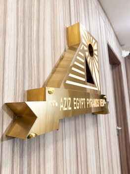 aziz palace front pyramids view and rooftop restaurant