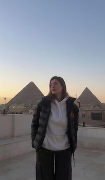 aziz palace front pyramids view and rooftop restaurant