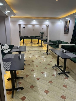 aziz palace front pyramids view and rooftop restaurant